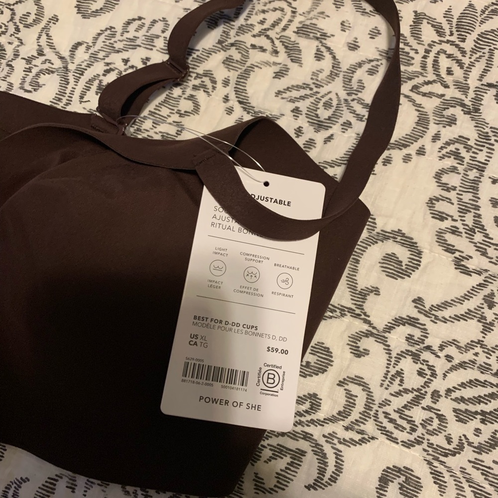 Sports bra new. Brown color.